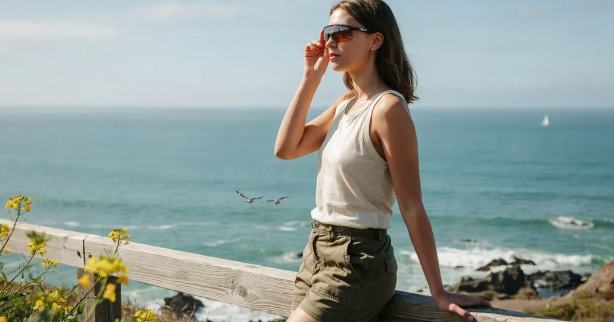 Stylish Heatwave Sunglasses placed on a wooden table in sunlight.